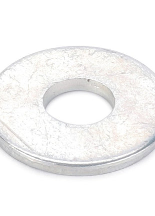 The AGCO | Flat Washer - Va023067 is a flat, metallic washer with a central hole, typically used in mechanical assemblies to distribute the load of a threaded fastener.