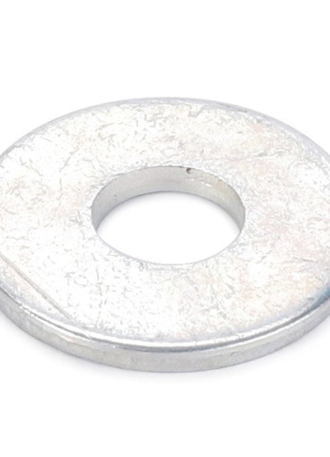 The AGCO | Flat Washer - Va023067 is a flat, metallic washer with a central hole, typically used in mechanical assemblies to distribute the load of a threaded fastener.
