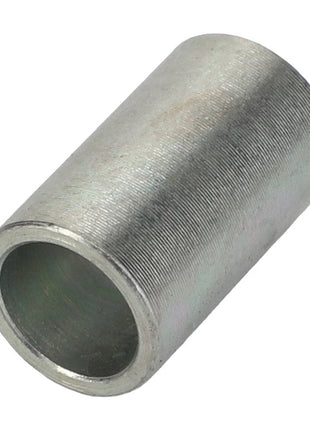 A close-up view of the AGCO Spacer - Acp0673620, showcasing its cylindrical metal construction with a hollow interior, smooth outer surface, and open end. This detailed depiction of the AGCO spacer enhances your understanding, especially when no current product description is available.