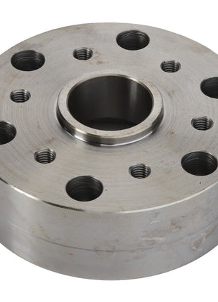 The AGCO Spacer - Acw0536560 is a circular metal disc featuring multiple holes of varying sizes drilled into its surface, potentially serving as a mechanical component or flange. No additional product description information is currently available.