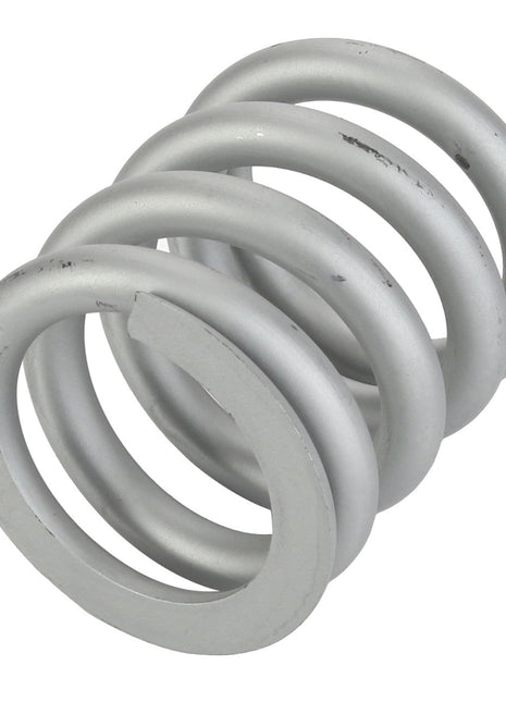 A close-up image of the AGCO | SPRING - D28760876, a silver metal compression coil spring wound in a cylindrical shape with several coils.