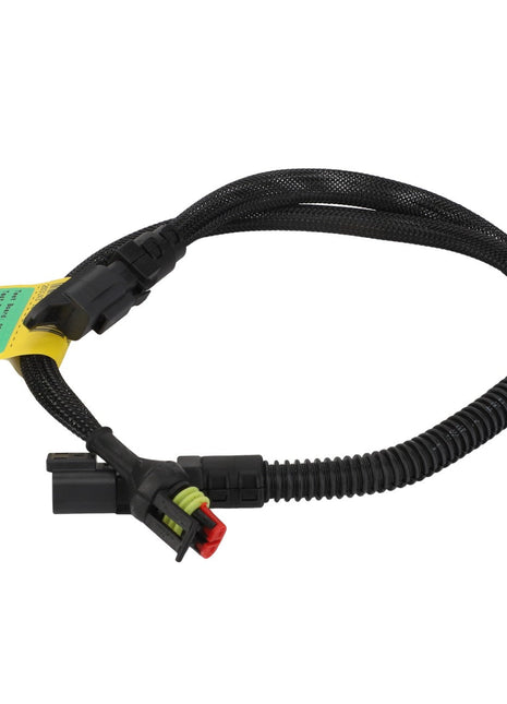 A black AGCO wiring harness, model Acx2821020, with connectors on each end and a yellow and green label attached near one connector. No current product description information is available.