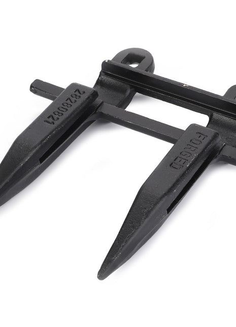 AGCO | Sickle Guard - D28280821 is a black metal dual spear-shaped farm implement attachment with mounting holes for superior cutting performance. Crafted as AGCO Parts Genuine, it ensures peak efficiency and durability.