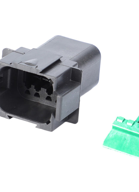 An AGCO Electrical Connector (F931901020140) in black plastic and a separate green component are placed on a white background. No current product description information is available.