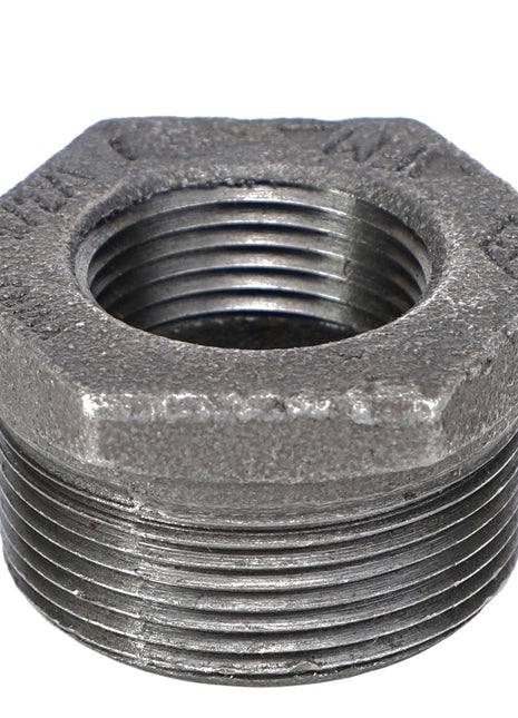 The AGCO | BUSH - AG556459 is a metallic hex bushing with threading on both the inside and outside, specifically designed for pipe fittings. Produced by the brand AGCO. Further information is currently unavailable.