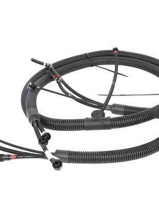 Introducing the AGCO | Def Hose - Acw8516590, a coiled automotive wiring harness from AGCO that features advanced connectivity with multiple connecting plugs and durable protective corrugated tubing.