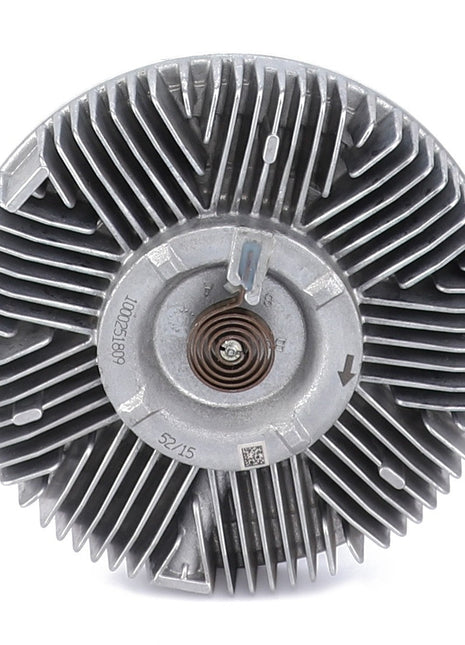 The AGCO Fan Drive, Viscous Coupling - Acp0327390 is a circular metal component featuring evenly spaced fins radiating outward from the center, with a central bolt and engraved markings. Designed to be part of a Viscous Fan Drive, it aids in reducing noise levels and lowering fuel consumption.