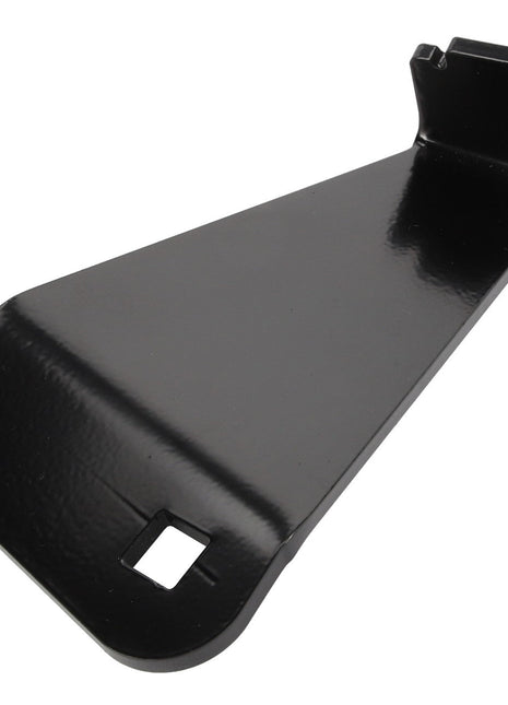 The AGCO Bumper - Acp0127650 is a sleek black metal bracket featuring a square hole on the broader end and a cleverly designed hook-like formation on the narrower side.