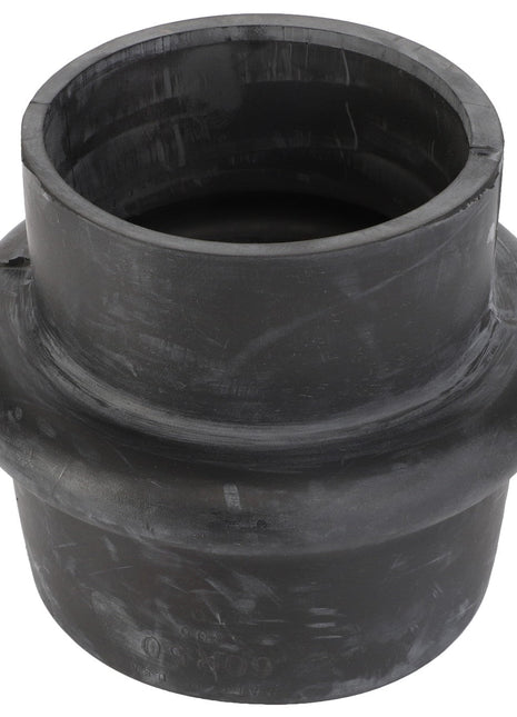 A black, cylindrical rubber adapter featuring a wider ribbed ring in the middle, known as the AGCO Reducer Hump Hose - Acp0010400 by AGCO.