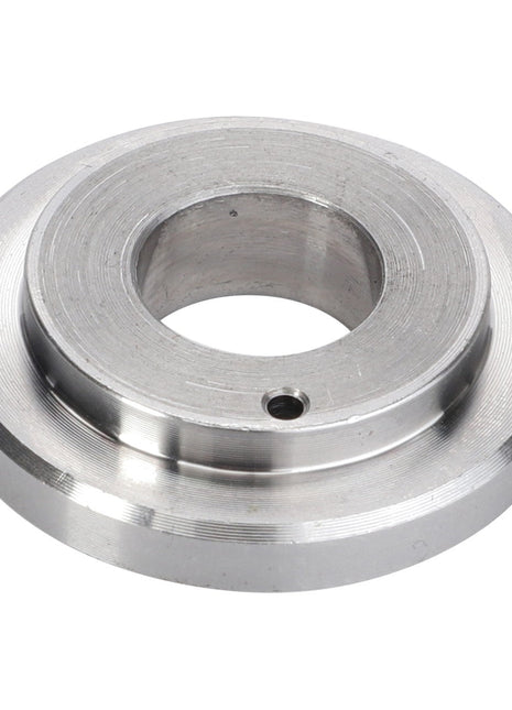 The product shown is an AGCO | Disc - F716201040130 by AGCO. It features a metallic circular flange with a central hole and a small side hole, complemented by a beveled finish on the outer edge. No further product description information is currently available.