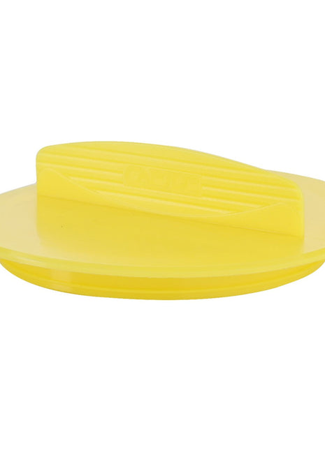 A round yellow plastic lid with a horizontal handle on top, known as the AGCO Cap - Acw7623940 from the brand AGCO.