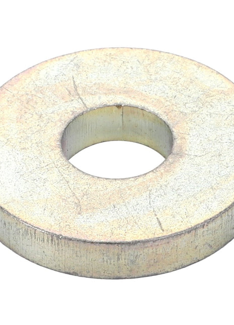 A round, metallic washer with a central hole viewed from an angle. The surface appears slightly worn; no current product description information is available for the AGCO | FLAT WASHER - D20400415.
