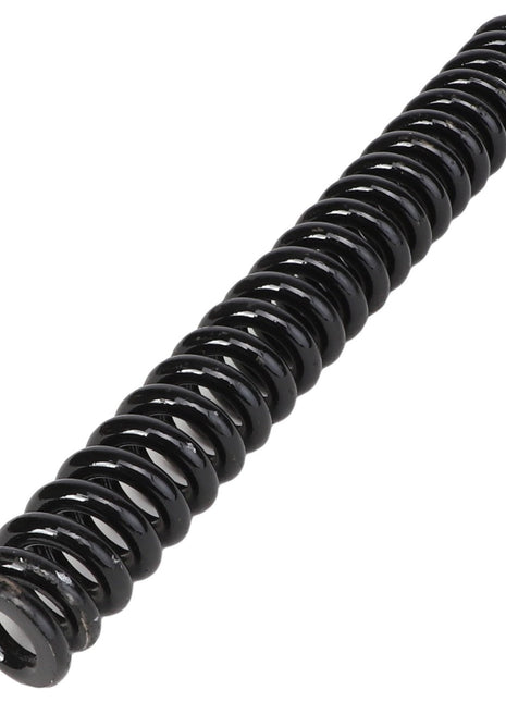 A black, tightly coiled metal spring with a cylindrical shape and even spacing between the coils, known as AGCO Compression Spring - Acp0016340.