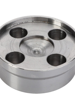 The AGCO Spacer, Front PTO Housing - 4281531M1 is a round metal component with a flat top surface featuring four evenly spaced holes, designed for optimum performance.