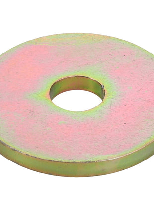 The AGCO CIRCLIP - ACY1515750, produced by AGCO, is a flat, round metallic washer with a central hole and a gold-colored, slightly iridescent finish. No additional product description information is currently available.
