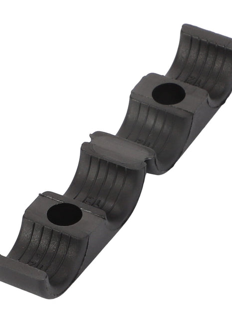 The AGCO Fitting - Acp0672610 is a black plastic cable organizer featuring three curved slots and two mounting holes.