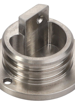 The AGCO | BEARING - AG714989 is a round metallic component with a flat base, featuring a prominent vertical tab with a hole and circular grooves on its surface. No current product description information available.