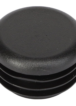 The AGCO | CAP - AG059020 is a black plastic end cap with a round top and ribbed sides, designed for enclosing the end of a cylindrical tube. Brand: AGCO. No current product description information is available.