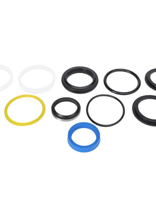 The AGCO SEALS KIT - AL5036156, featuring an assortment of black, white, yellow, and blue O-rings and seals in various sizes, is artfully arranged against a pristine white background.
