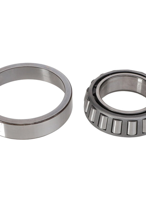 The AGCO Taper Bearing - 3010040X91 and a metal ring are displayed side by side on a white background, showcasing their precision and durability. Product description currently not available.