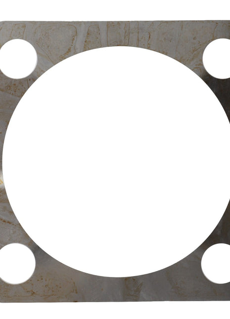 The AGCO | SHIM - F716300020510 from AGCO is a metal gasket with a square outer shape, featuring a central circular cutout and four circular holes located at each corner.