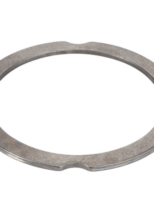 The AGCO | Compensating Ring - F007200210370 is a flat, circular metal ring with a smooth surface and small notches on its inner edge, making it ideal for precision fittings.