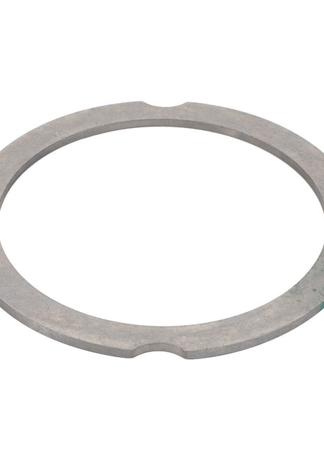 AGCO | Compensating Ring - F007200210240 is a circular metallic washer with four small notches evenly spaced along its outer edge. No current product description is available for this product.
