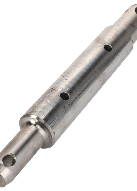 An image of the AGCO BOLT - FEL141342, a cylindrical metal shaft featuring multiple circular holes and notches along its length, expertly engineered by AGCO for precision and durability.