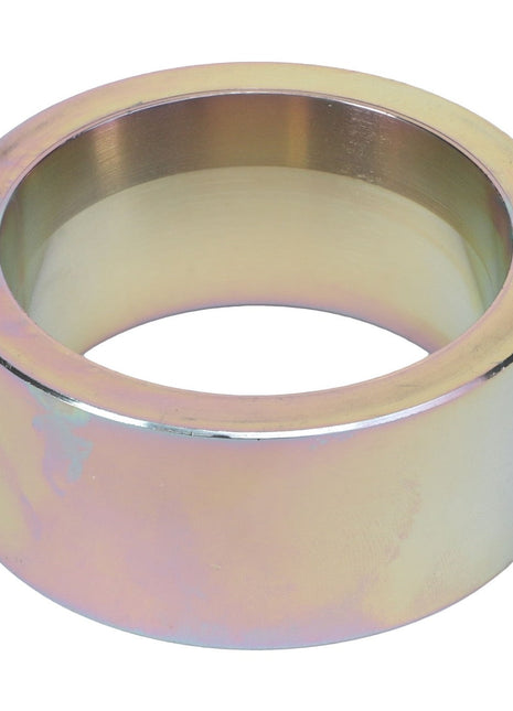 The AGCO Spacer - Acw103982A is a metallic cylindrical ring featuring a smooth, reflective surface with shades of silver and subtle iridescent hues. No current product description information is available.