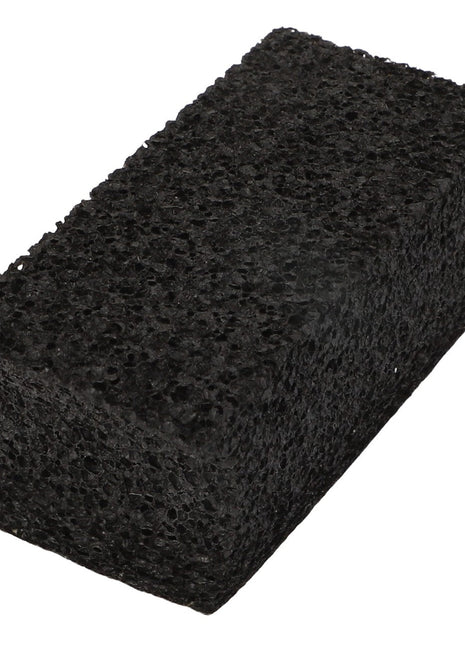 Introducing the AGCO | Foam - Acp0667330: a black abrasive scrub sponge with a rough texture, ideal for thorough cleaning tasks.
