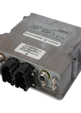 The AGCO | Module - Acx304547A, a rectangular electronic device encased in a metal housing, features multiple ports and connectors on one side.