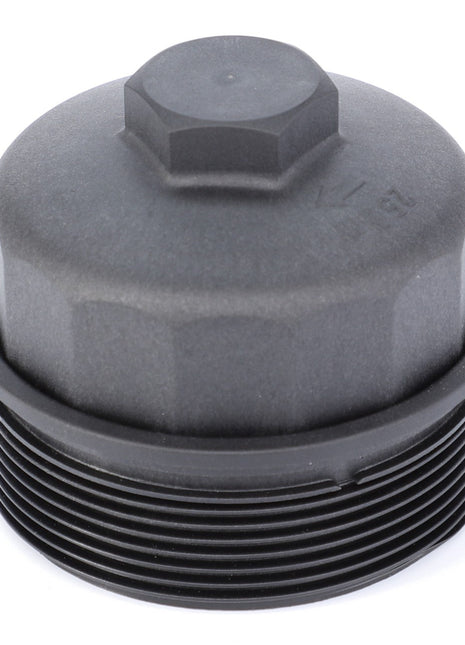 A black plastic oil filter cap with a hex-shaped top for a wrench and threaded bottom for secure attachment, complemented by AGCO Genuine Filter Housing - F716201060110 to maximize performance.