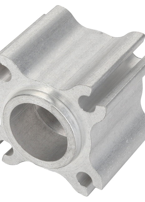 Introducing the AGCO Spacer - Acp0290910, a precisely machined metal component featuring a cylindrical hole at its center and four distinct protruding ridges along its outer edges. A top-quality product under the trusted brand name AGCO.