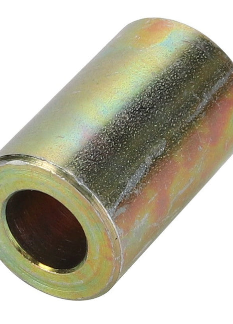 A cylindrical metal spacer from AGCO, specifically the Spacer - 4280582M1, featuring a hollow center and a slightly reflective surface with a mix of golden and metallic hues.