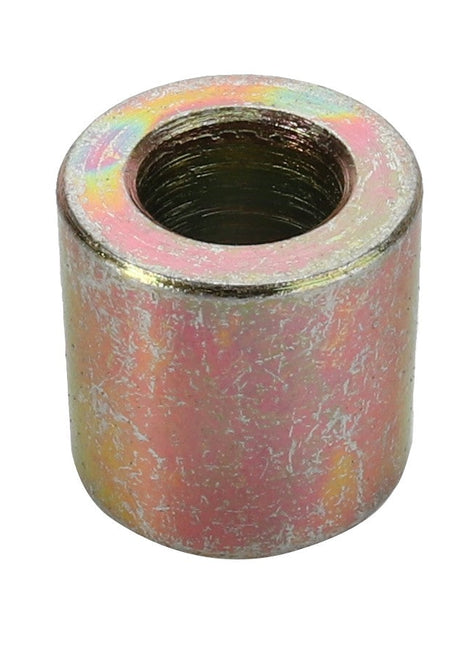 The AGCO BUSH - D26733466 is a cylindrical metal spacer featuring a threaded hole in the center. It has a slightly rough surface and boasts a metallic, multicolored finish. Currently, there is no information available regarding its availability or specifications.