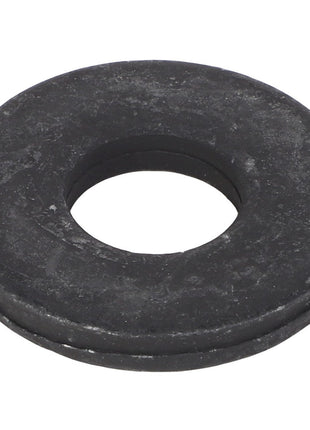 The AGCO FLAT WASHER - AG521690 is a round, flat black rubber washer featuring a central hole, displayed against a white background. Currently, no additional product description information is available.