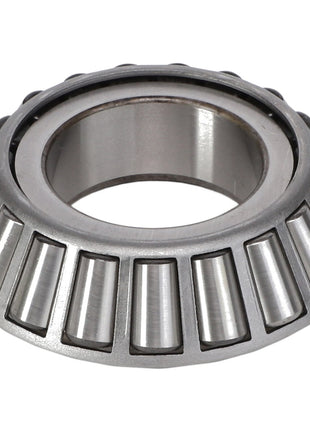 Close-up image of the AGCO Tapered Roller Bearing Cone - 8050676, featuring metal rollers and a conical inner ring by AGCO. No current product description available.