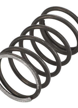 Close-up image of the AGCO | Spring - Acp0676350, a single metal compression spring from AGCO, featuring a dark matte finish and approximately five coils in height, set against a plain white background.