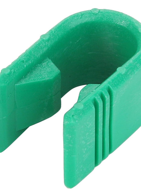 A green plastic AGCO clip, model CLIP - 0.008.8384.0, shaped like a horseshoe with two internal prongs. For any ordering questions, please contact support.