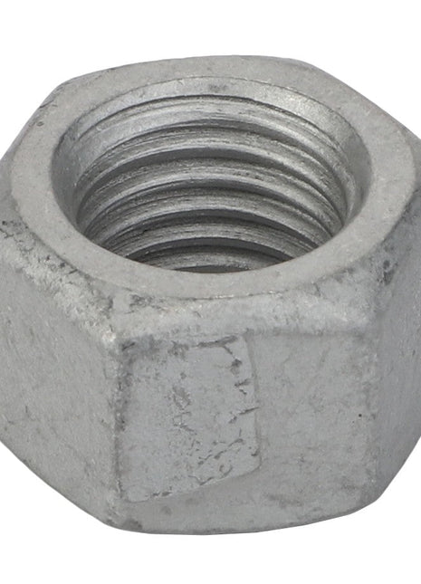 A close-up image of the AGCO Hex Nut - Acp0702750, a metallic hexagonal nut with an internal threaded hole, showcasing its precise engineering.