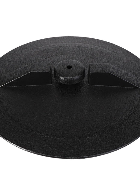 Close-up of the AGCO | COVER - BD5781, a black circular object with a textured surface and a central raised handle featuring two symmetrical ridges.