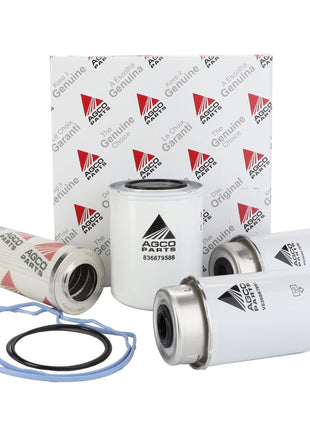A collection of AGCO Service Kit - Acp0525350 filters and gaskets meticulously displayed alongside their packaging.