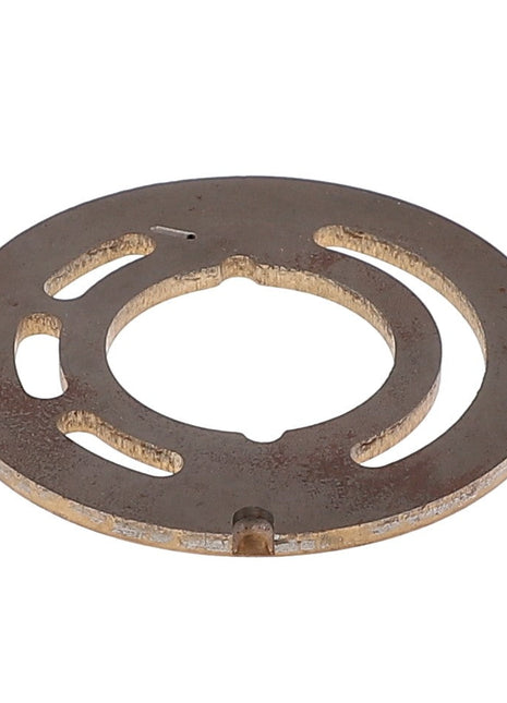The AGCO | Distributor Plate - F412940010040, branded by AGCO, is a round, flat metal disk featuring cut-out patterns and a central hole, resembling a spacer or washer. No current product description available.