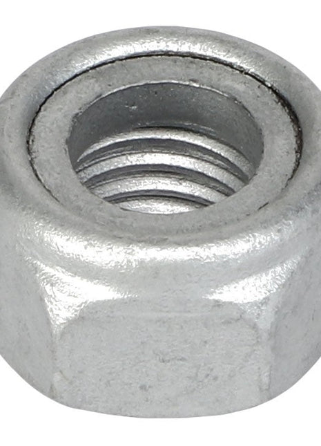 Close-up of the AGCO | Hex Top Lock Nut - Acw1842670 with internal threading, used in conjunction with a bolt for fastening applications. No current product description information is available, but the silver nut features a precisely machined surface ideal for secure connections.