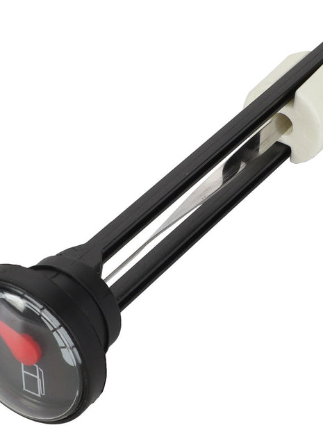 The AGCO | FUEL GAUGE - ATV0570-086 by AGCO features a classic black and white design with a red indicator needle and a float mechanism on a plastic arm. Its simple yet efficient construction sets it apart from other products, perfectly encapsulating functionality and ease of use.