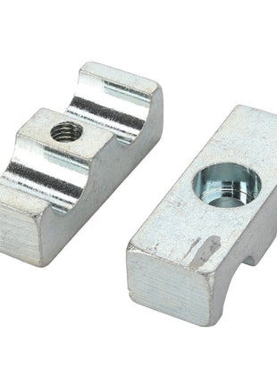 Two AGCO Clamp - Acp0419740 metallic mounting brackets featuring both threaded and non-threaded holes are placed side by side on a plain background. One bracket is depicted from the top view, while the other is shown from the bottom view. Additional product specifications are currently unavailable.