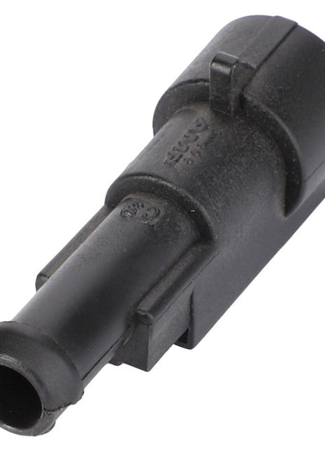 The AGCO Receptacle Housing for AC Compressor (F117551020050) is a black plastic electrical connector with a cylindrical shape and a latch mechanism, designed for optimal performance in heating and air conditioning systems, ensuring reliability as part of AGCO Parts Genuine.