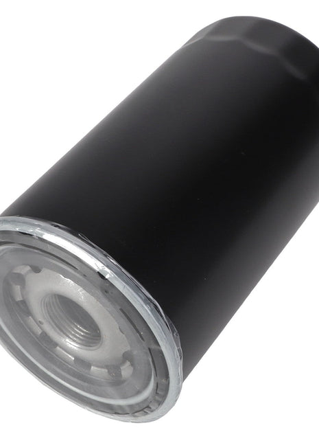 The AGCO Hydraulic Filter Spin On - 7077903M1 is a cylindrical black metal filter featuring a visible threaded opening and a ridged end, designed for clean oil and high dirt holding capacity.