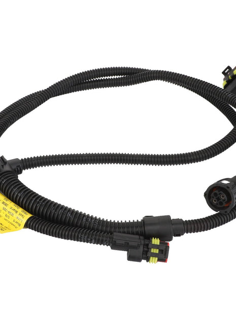 The AGCO Harness - Acw0343170, an electrical wiring harness with multiple connectors and a yellow label with text, is coiled neatly on a white background. No current product description information is available.