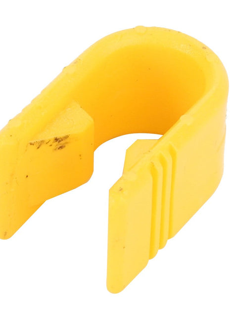 Introducing the AGCO | CLIP - 0.008.8383.0, a yellow plastic clip featuring a U-shaped design and ridged sides, perfect for organization. For any product questions or ordering inquiries, our support team at AGCO is here to help.